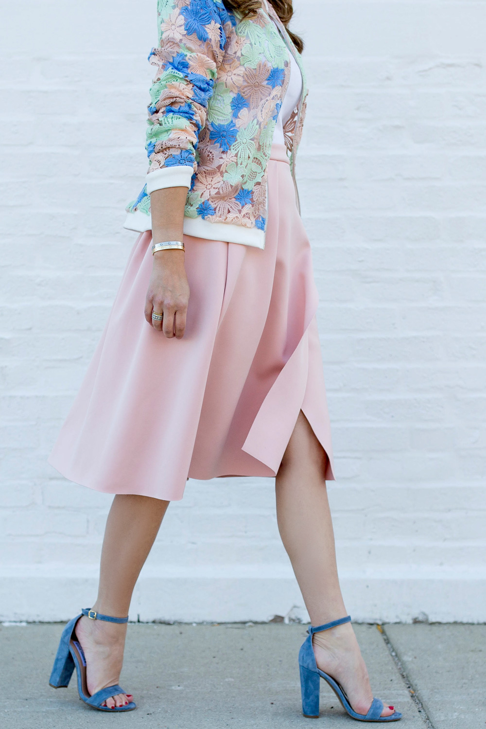 Jennifer Lake Style Charade in a Nordstrom pastel lace bomber jacket, pink skirt, and blue Steve Madden Carrson sandals
