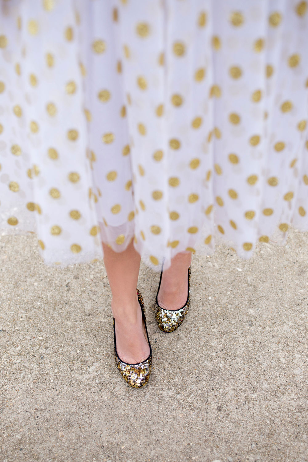 Jennifer Lake Style Charade in a T and J Designs gold glitter polka dot midi skirt and J Crew sequin pumps