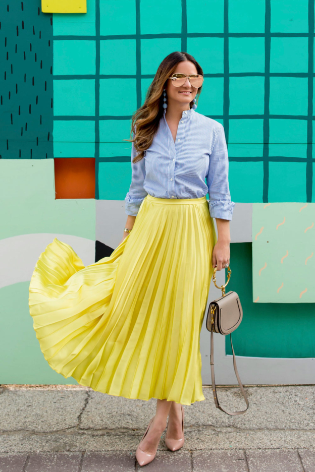 Yellow Satin Pleated Skirt with a Navy Wool Blazer