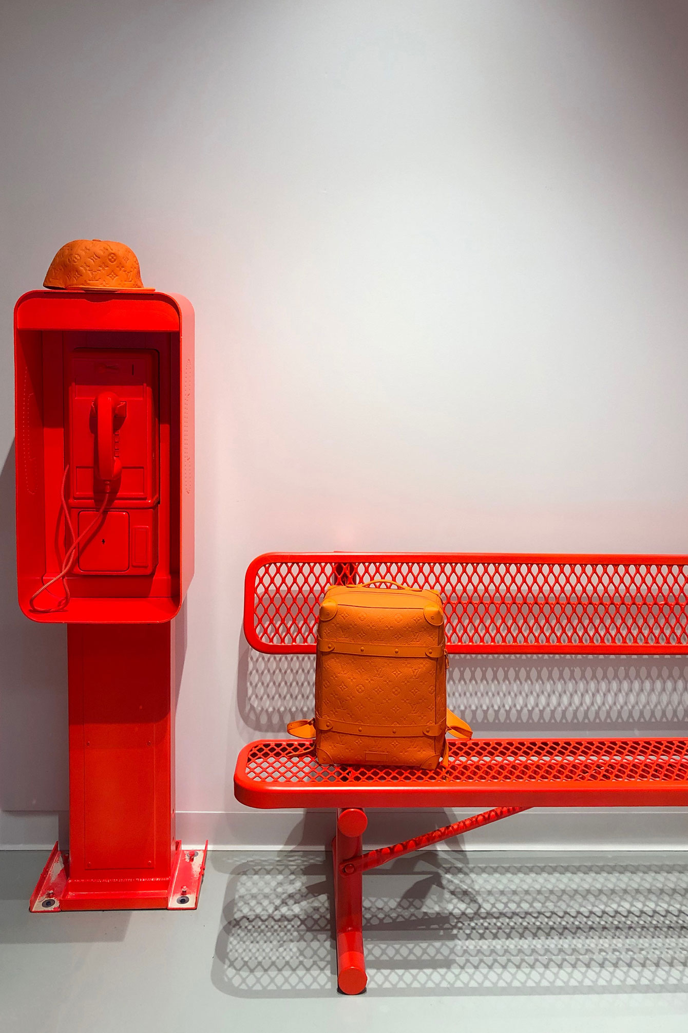 Louis Vuitton's Neon Orange Chicago Pop-Up Emerges as Summer's New Temple  of Cool