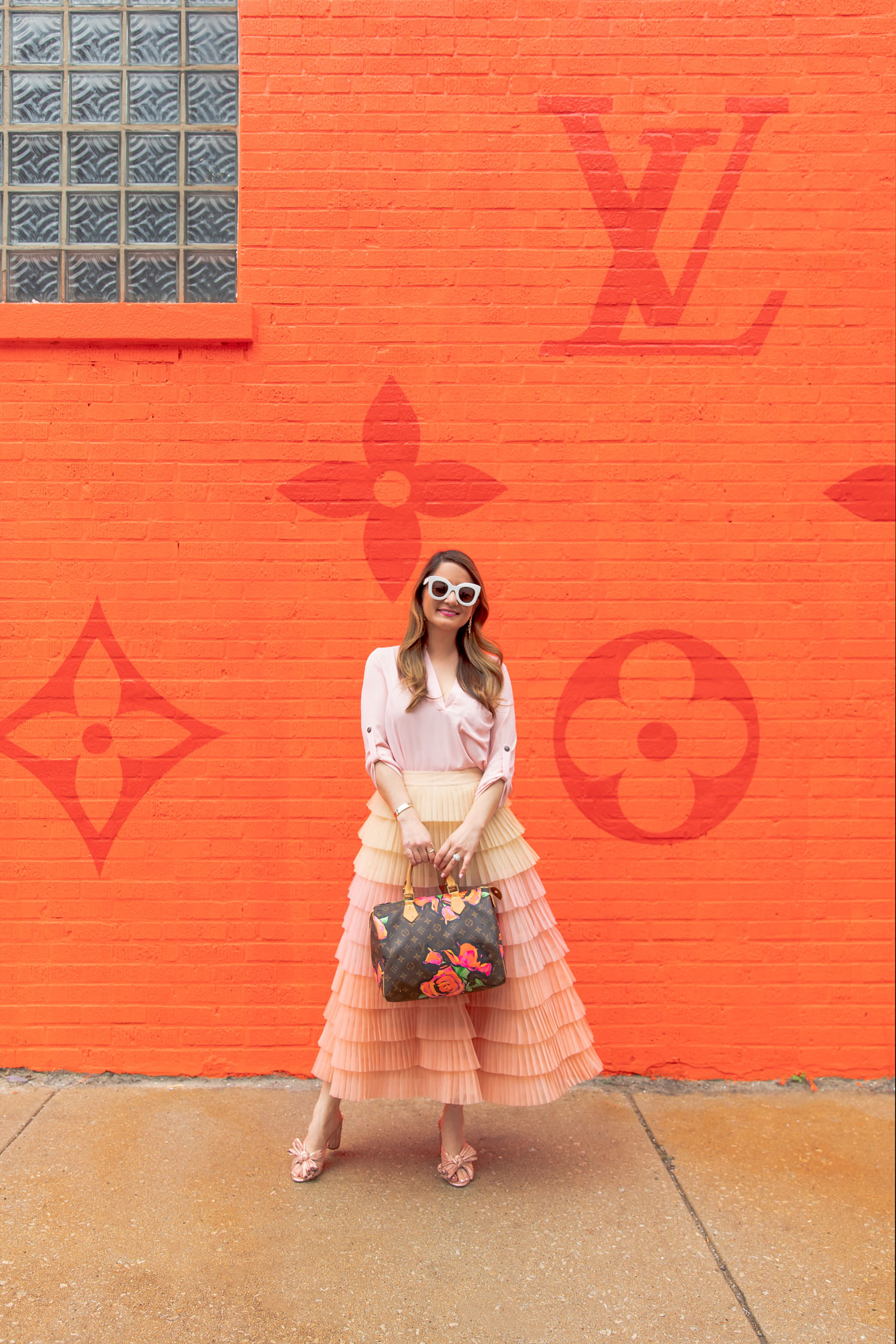 Louis Vuitton's Neon Orange Chicago Pop-Up Emerges as Summer's New Temple  of Cool