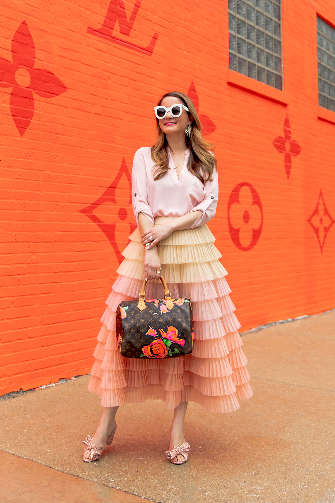 Louis Vuitton's Neon Orange Chicago Pop-Up Emerges as Summer's New Temple  of Cool