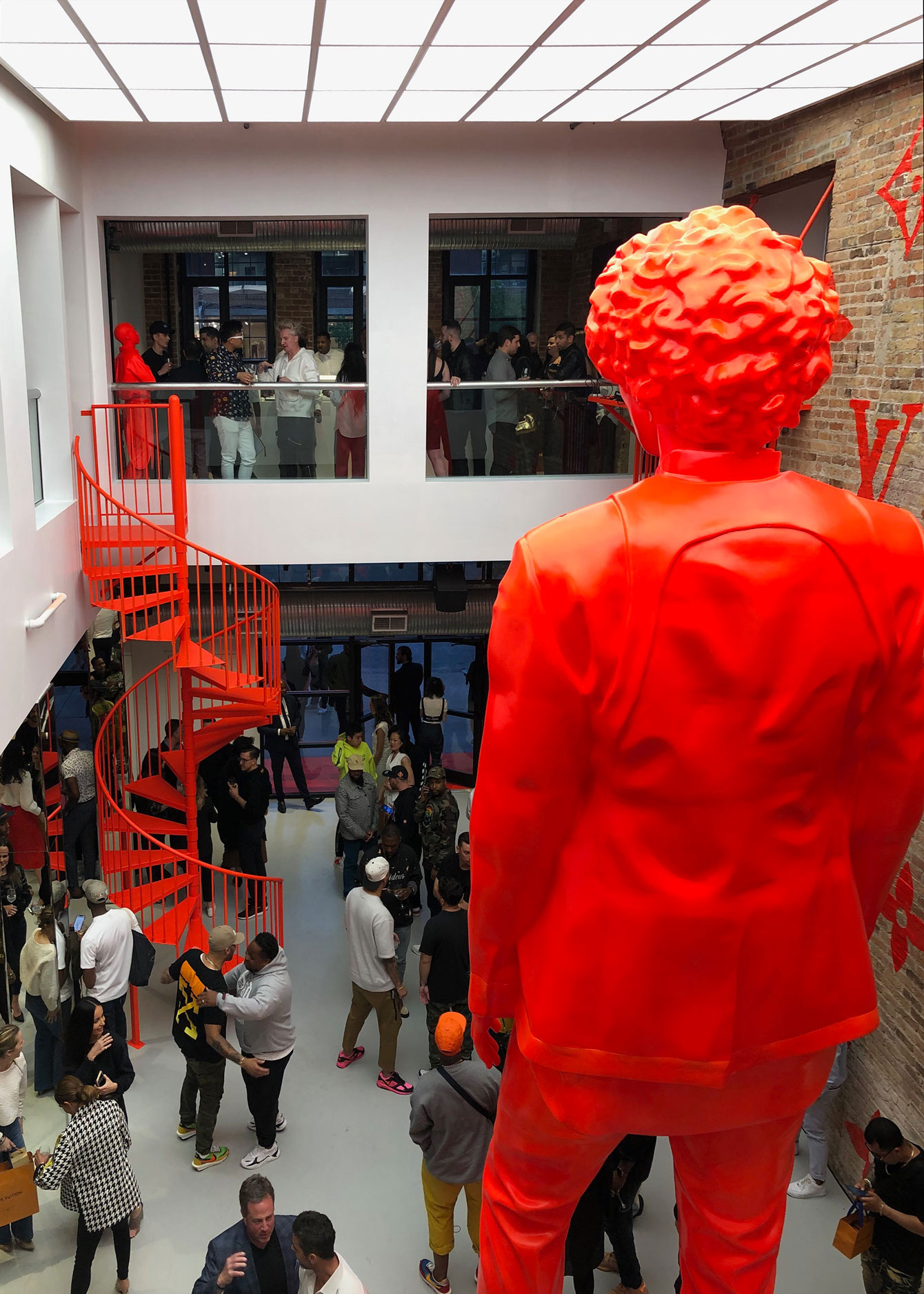 Louis Vuitton's Neon Orange Chicago Pop-Up Emerges as Summer's New Temple  of Cool
